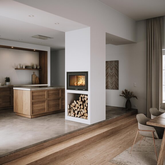 Wood fireplace insert R-500 front version, installed between kitchen and dining room