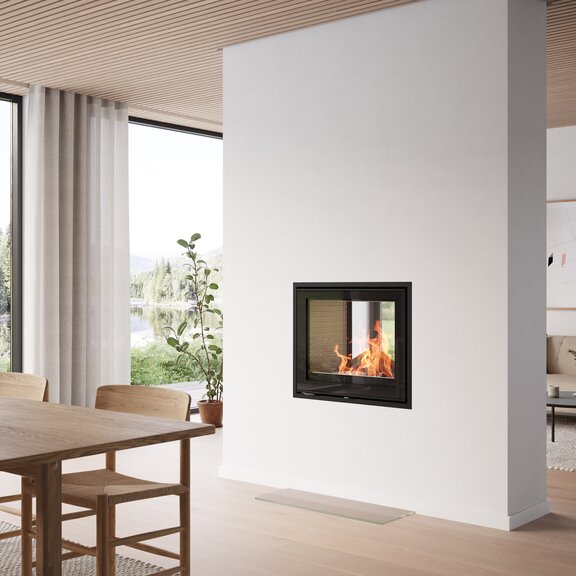 R-600 Tunnel fireplace insert in a modern living room with wooden elements and large windows