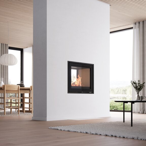 R-600 tunnel fireplace insert with white panelling in a bright living room with wooden table