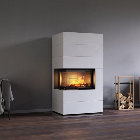 Wood fireplace VISIO 2 ELEMENT built into white-painted concrete elements next to sofa and sideboard