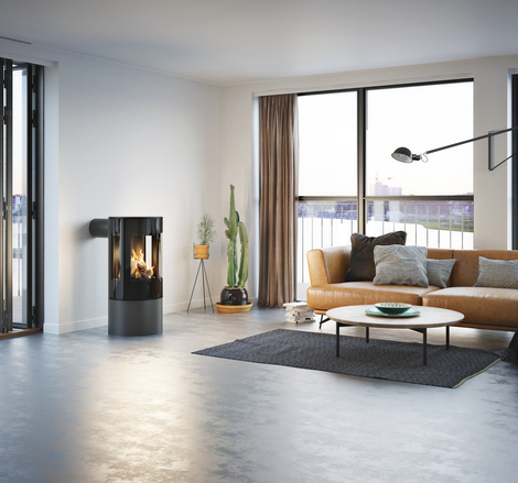 VIVA 100 L GAS in platinum with glass door Gas stove VIVA 100 L in platinum with glass door in a minimalist flat with a view of the skyline