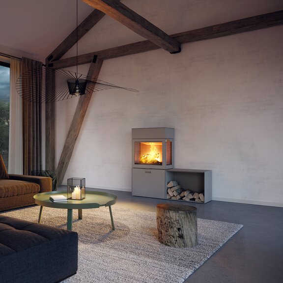 Wood stove MAX 600/130 in nickel with two side windows and side bench in an elegant living room in brown tones