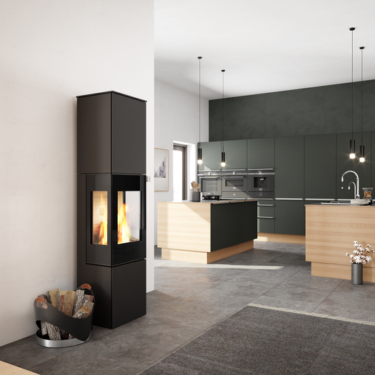 NEXO 185 in black with glass door Wood stove NEXO 185 in black with glass door and two side windows in the centre of the kitchen and living room