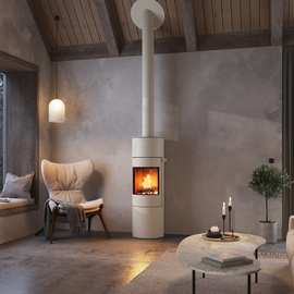 VIVA 140 L in the colour sand with steel door Wood stove VIVA 140 L in the colour sand with steel door in a modern flat in earth tones