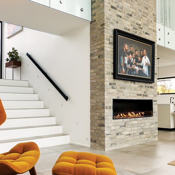 Bioethanol burner Montreal Front in the living room with stone wall