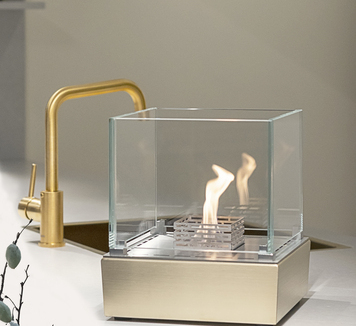 Nice in kitchen next to golden tap Nice bioethanol burner in kitchen next to golden tap