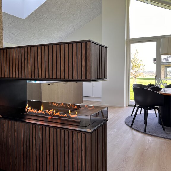 Bioethanol burner Panel Wall deep dark wood panelling in the dining room