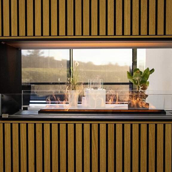 Electric fire panel wall room divider in high wooden panelling on the side