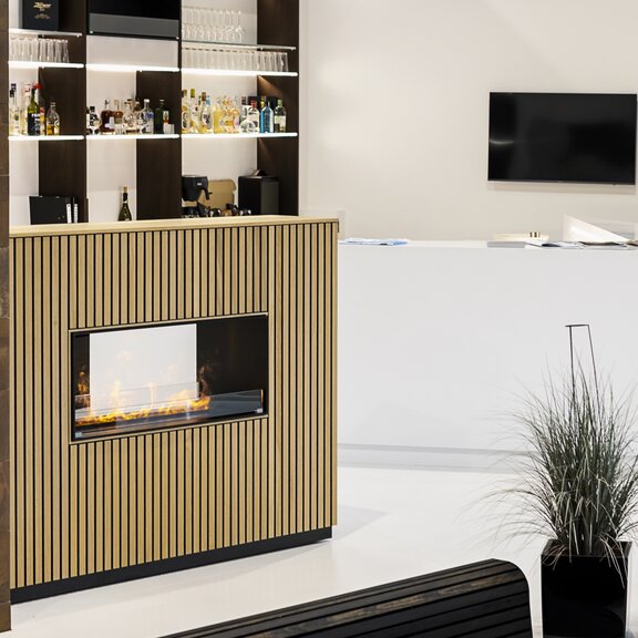 Electric fire, panel wall, deep tunnel, wood panelling with bar